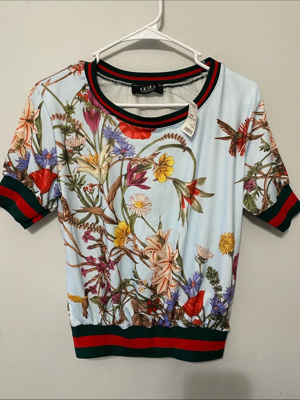 AKIRA Light Blue Floral Short Sleeve Top with Red and Green Stripe Trim